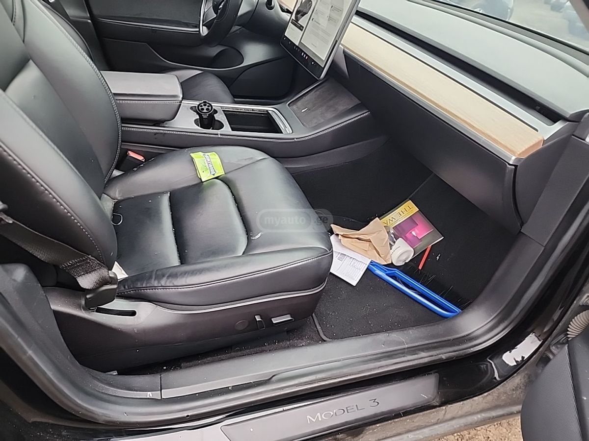 Tesla Model 3 - фото 7