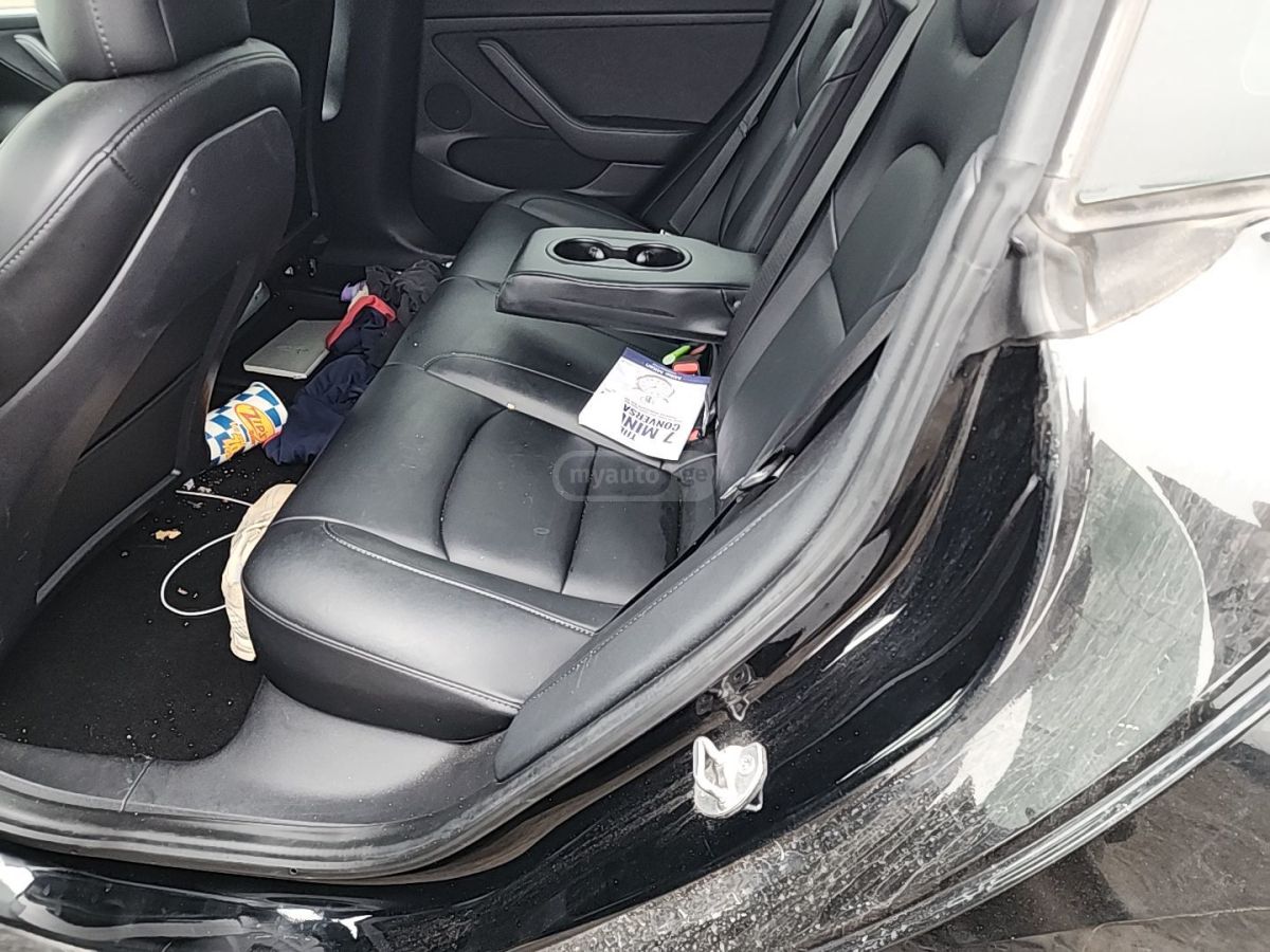 Tesla Model 3 - фото 8