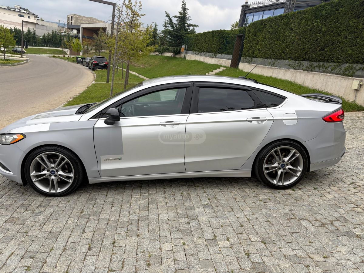 Ford Fusion - фото 10