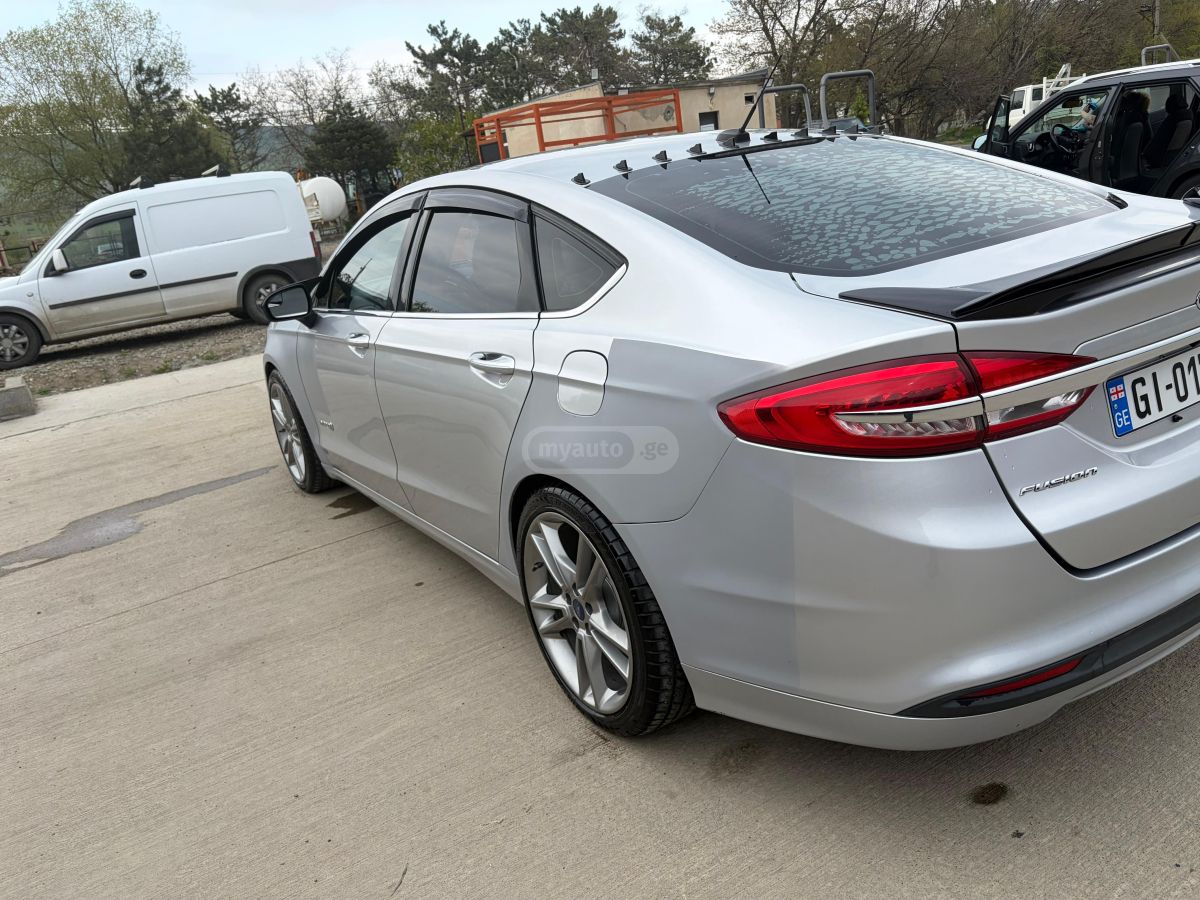 Ford Fusion - фото 6