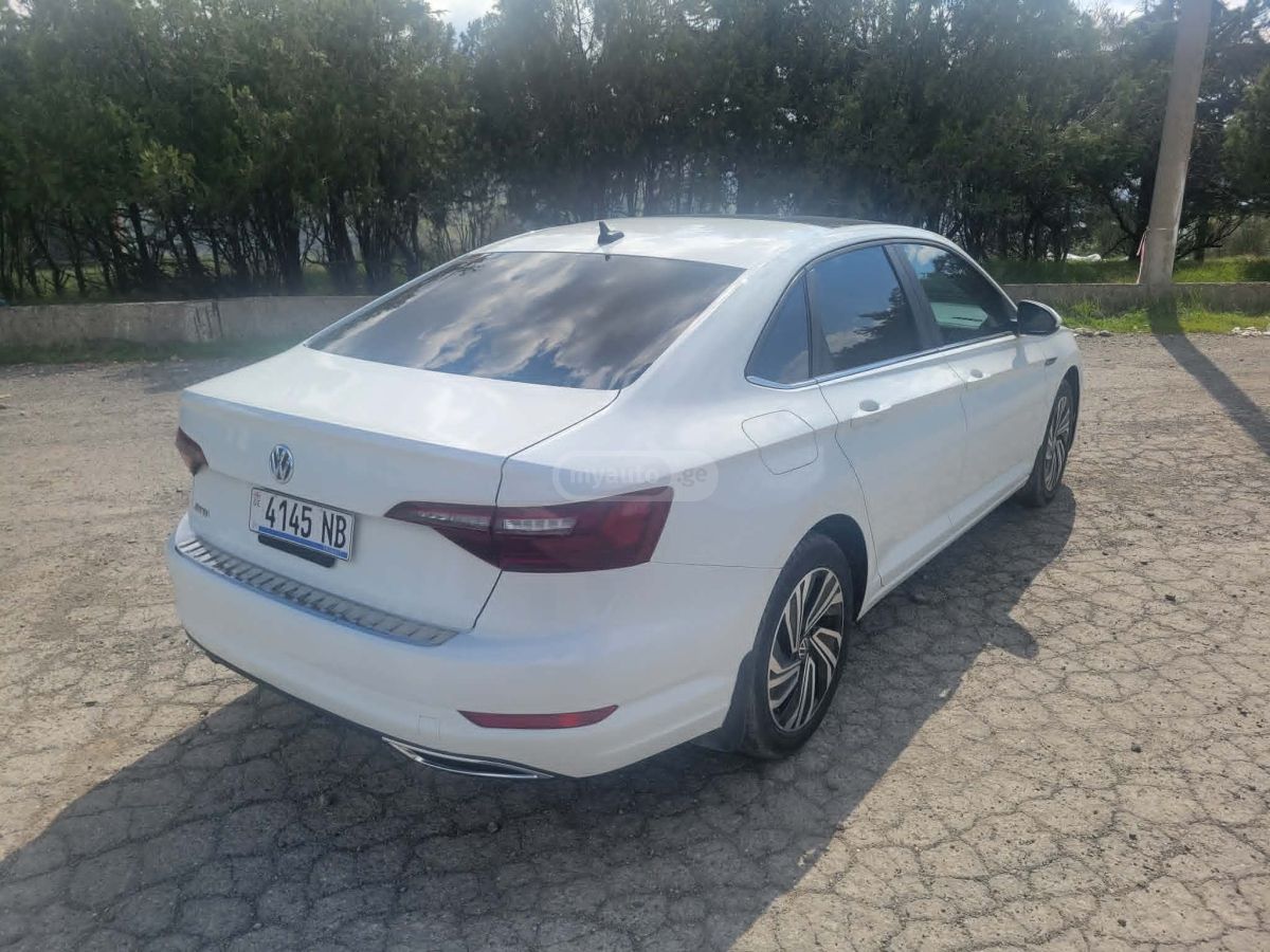 Volkswagen Jetta - фото 4