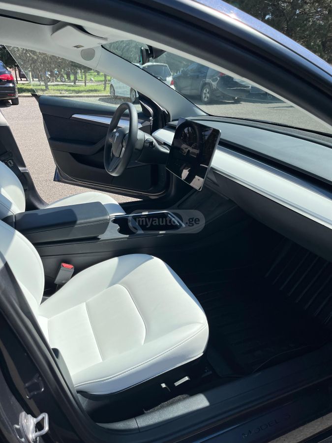 Tesla Model 3 - фото 10
