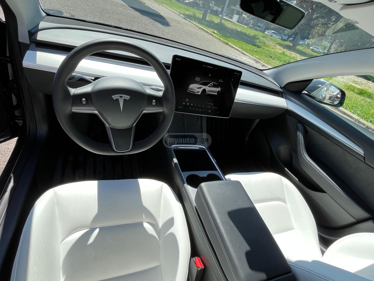 Tesla Model 3 - фото 6