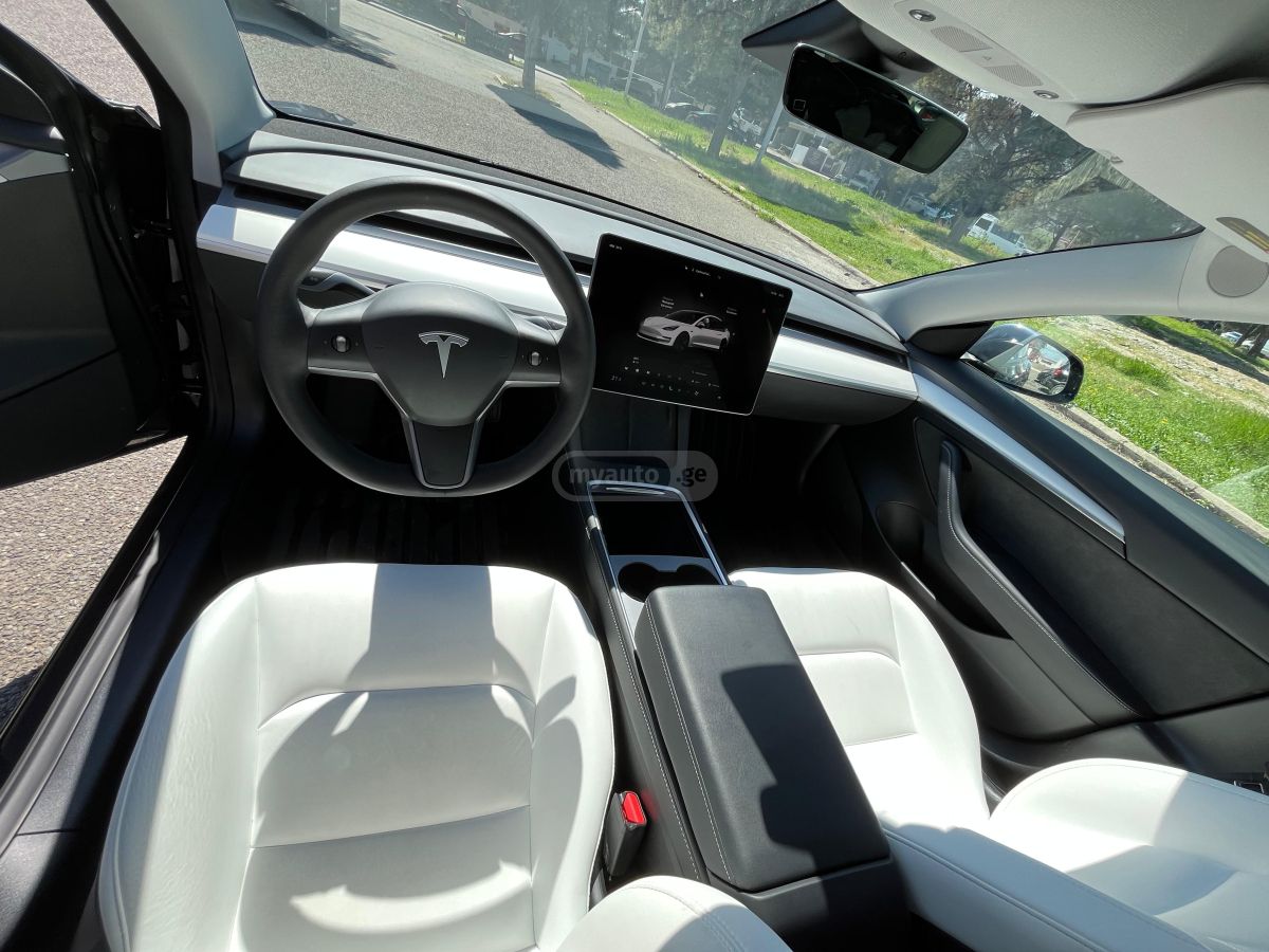 Tesla Model 3 - фото 7