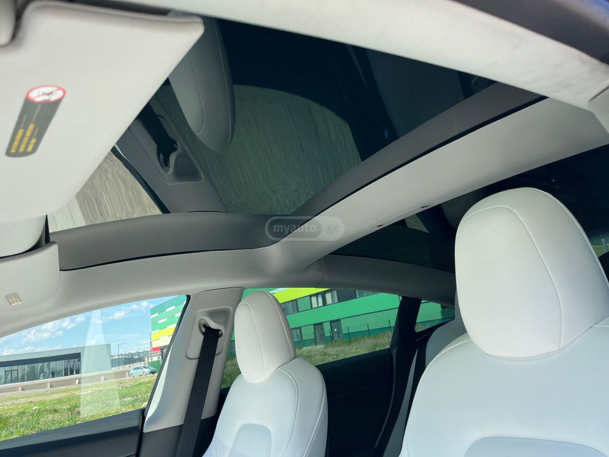 Tesla Model 3 - фото 8