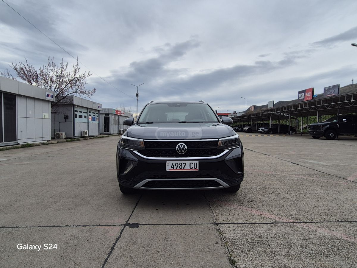 Volkswagen Taos - фото 11