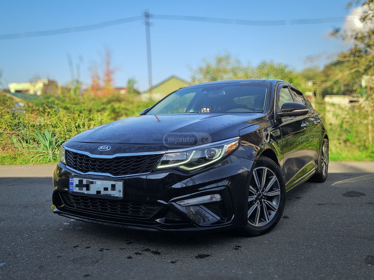 Kia Optima - фото 1
