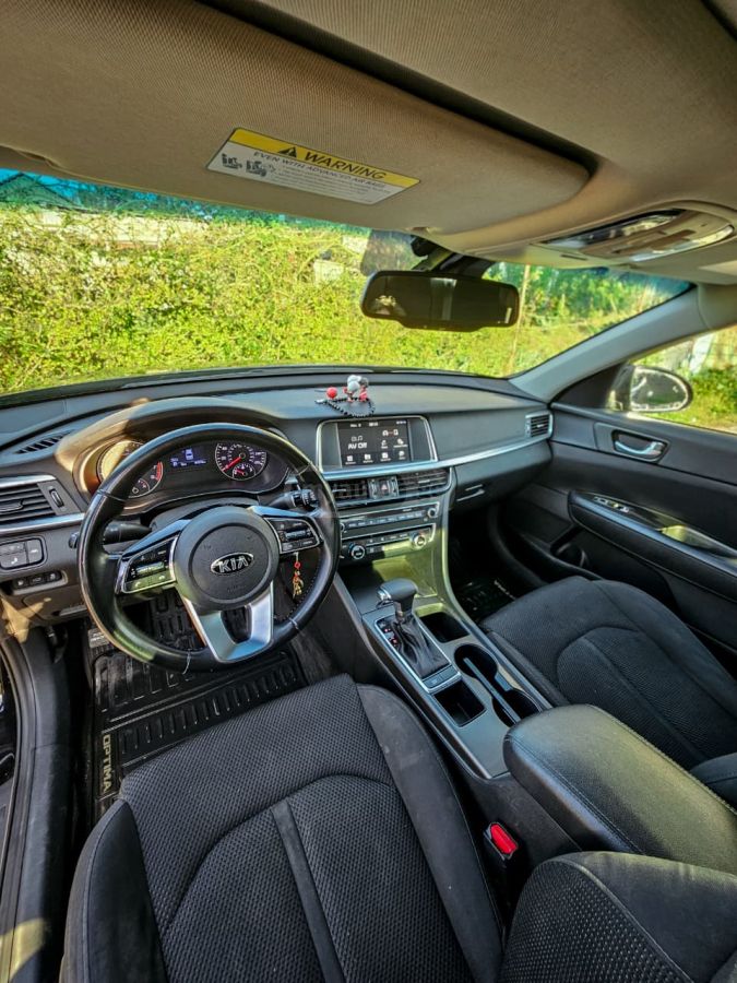 Kia Optima - фото 4