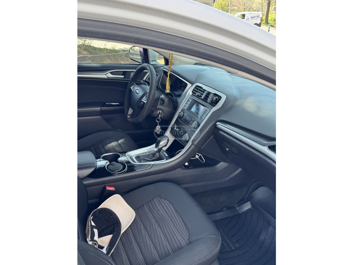 Ford Fusion - фото 13