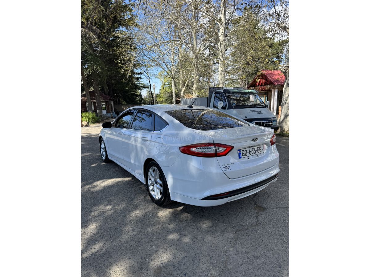 Ford Fusion - фото 7