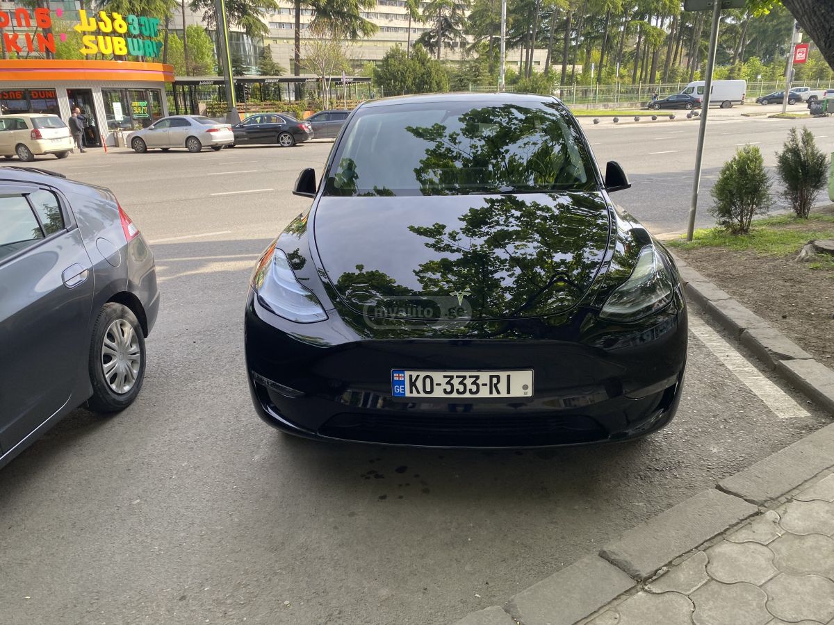 Tesla Model Y 2024 — фото 9 купить в Москве