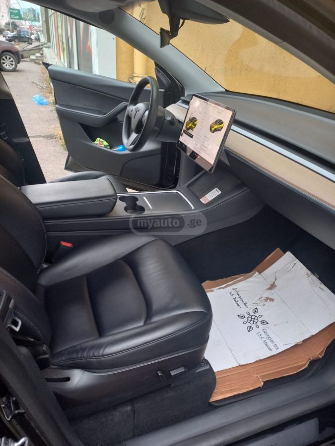 Tesla Model Y - фото 10