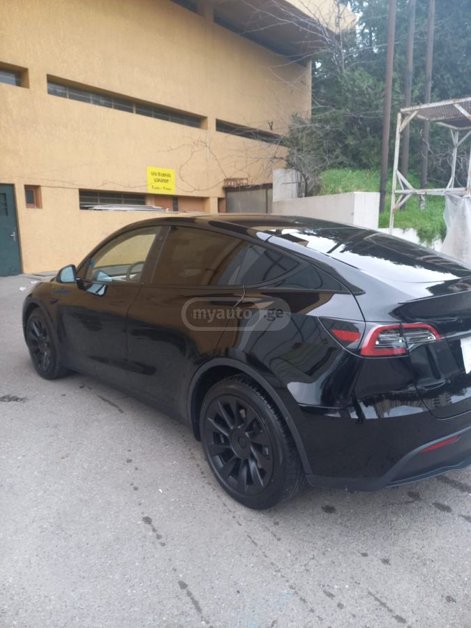 Tesla Model Y - фото 6