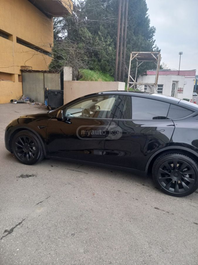 Tesla Model Y - фото 7