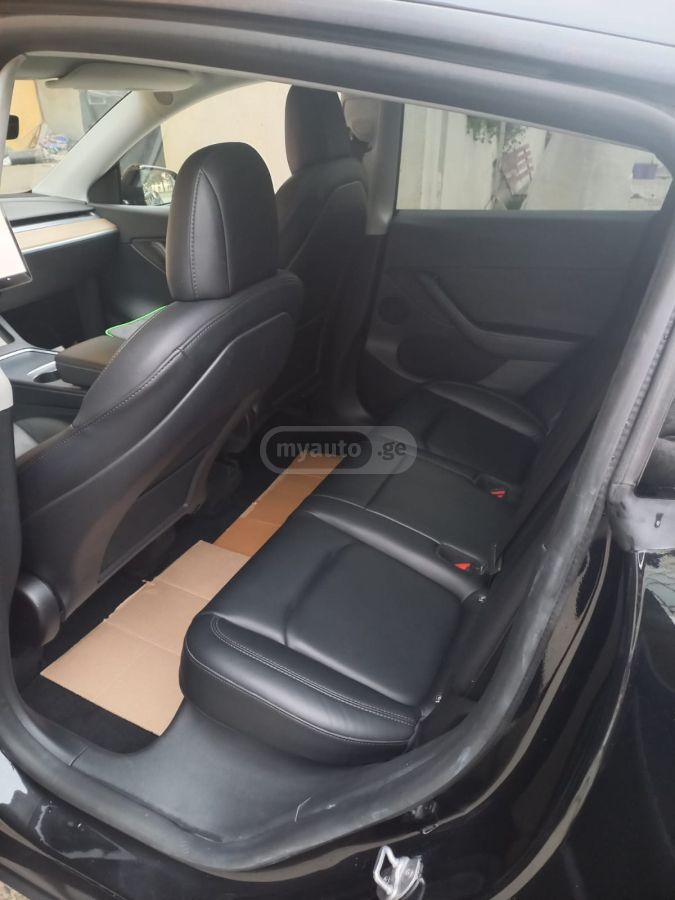 Tesla Model Y - фото 8