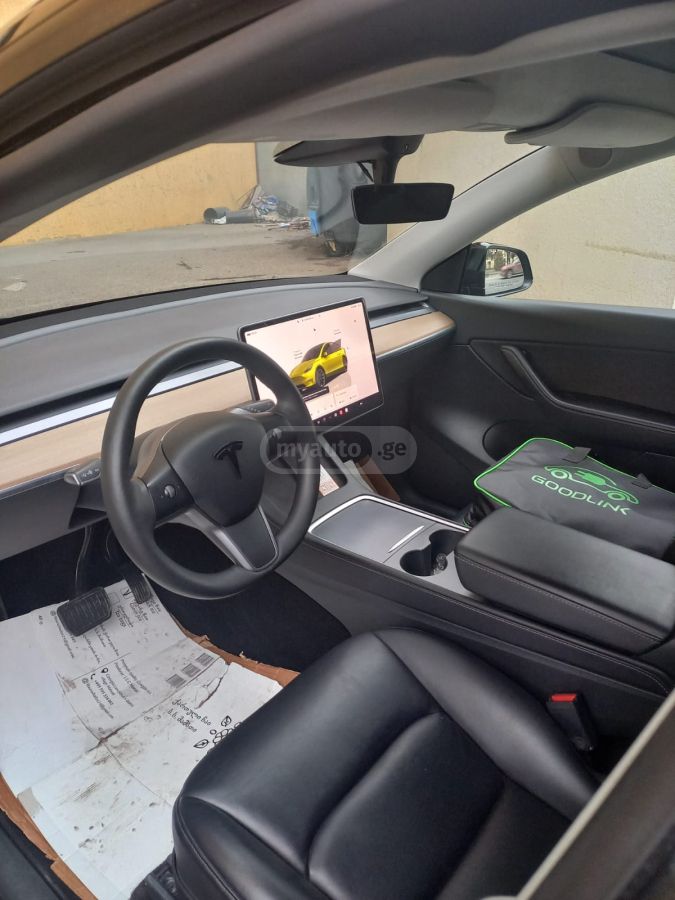 Tesla Model Y - фото 9