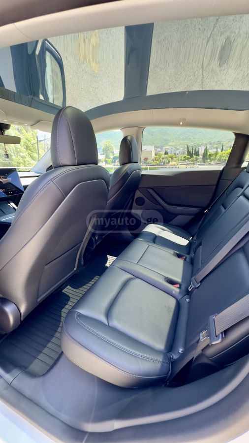 Tesla Model Y - фото 11