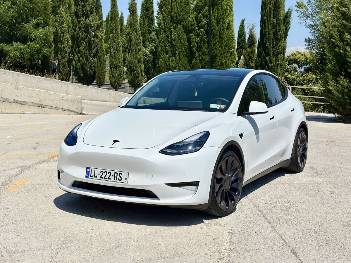 Tesla Model Y - фото 8