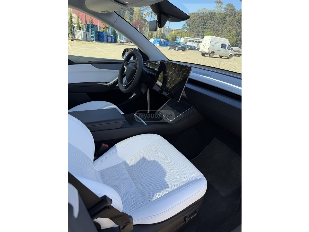 Tesla Model Y - фото 5