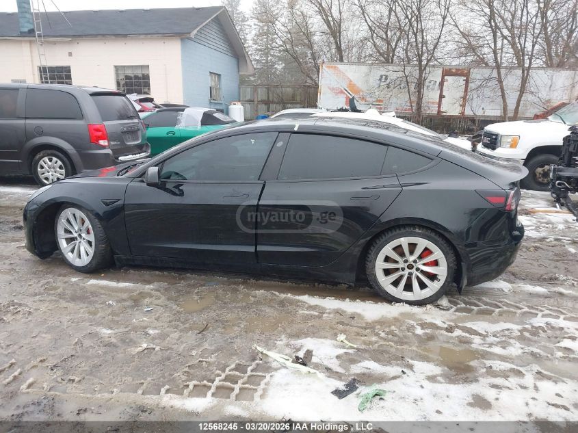 Tesla Model 3 - фото 12