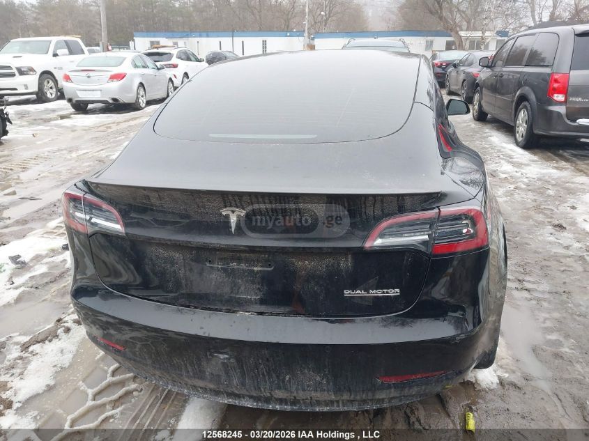 Tesla Model 3 - фото 13