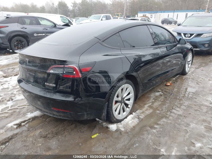 Tesla Model 3 - фото 4