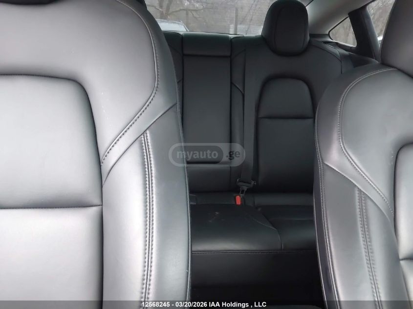 Tesla Model 3 - фото 8