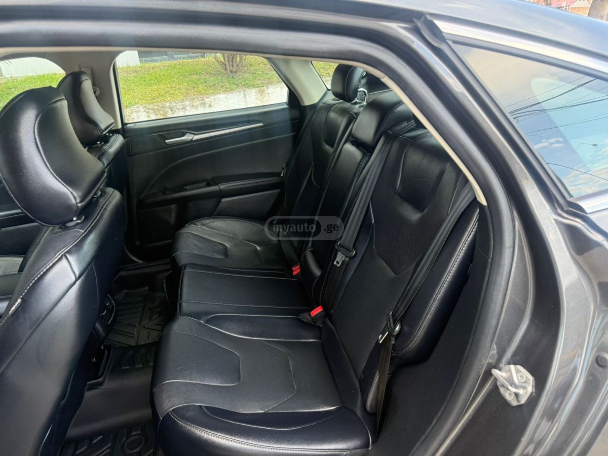 Ford Fusion - фото 12