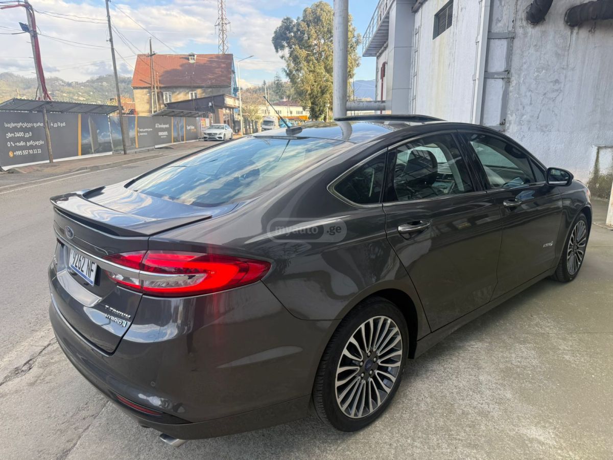 Ford Fusion - фото 8