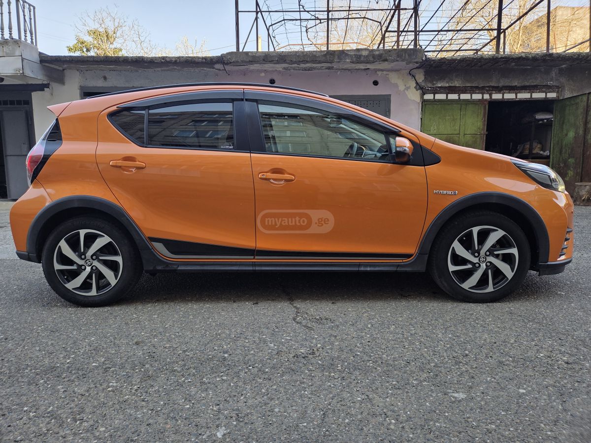 Toyota Aqua - фото 1