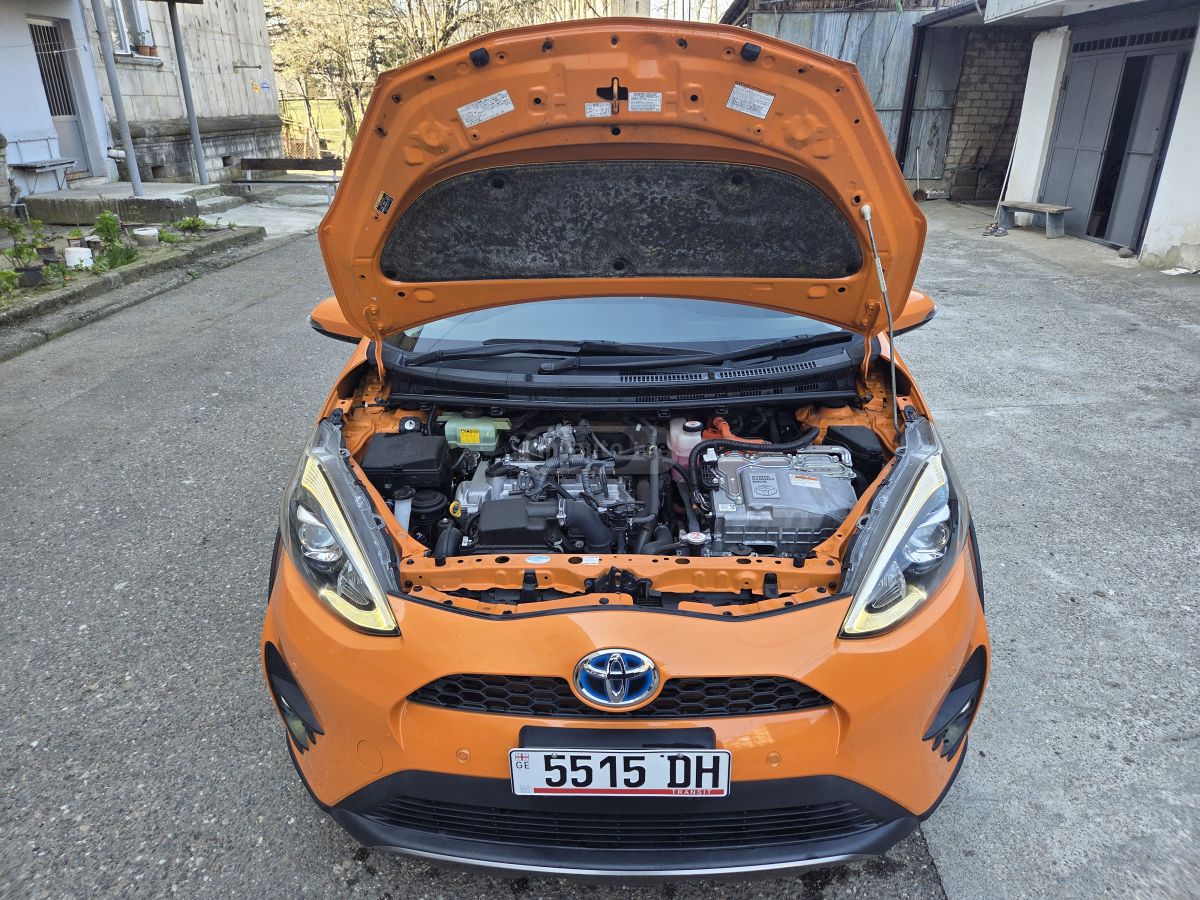 Toyota Aqua - фото 13