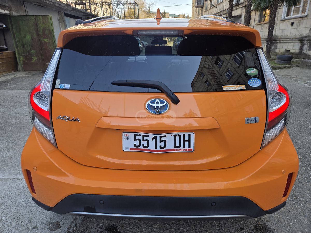 Toyota Aqua - фото 7