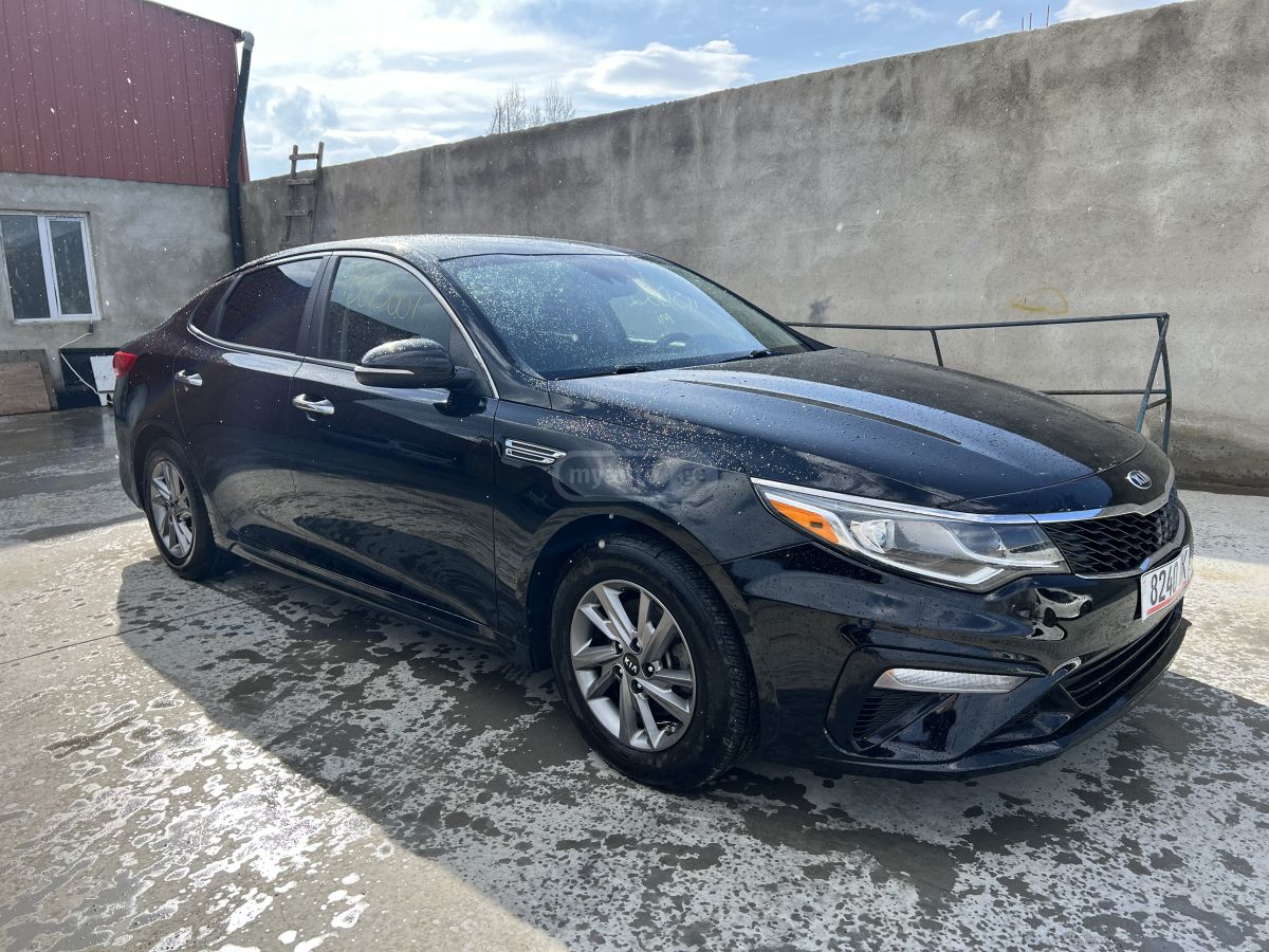 Kia Optima - фото 1
