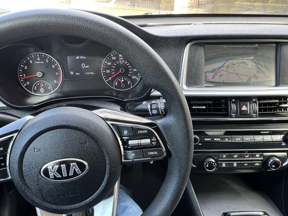 Kia Optima - фото 10