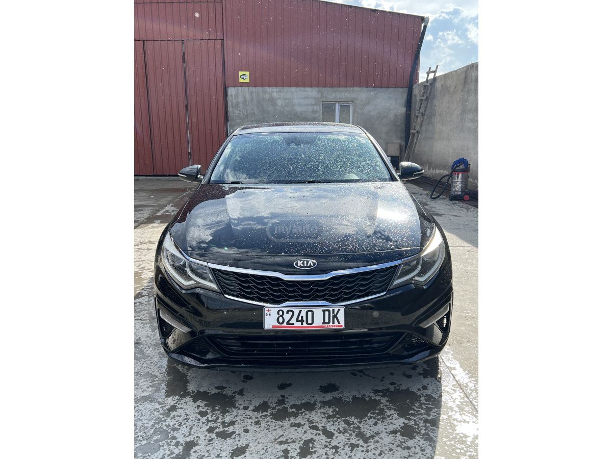 Kia Optima - фото 12