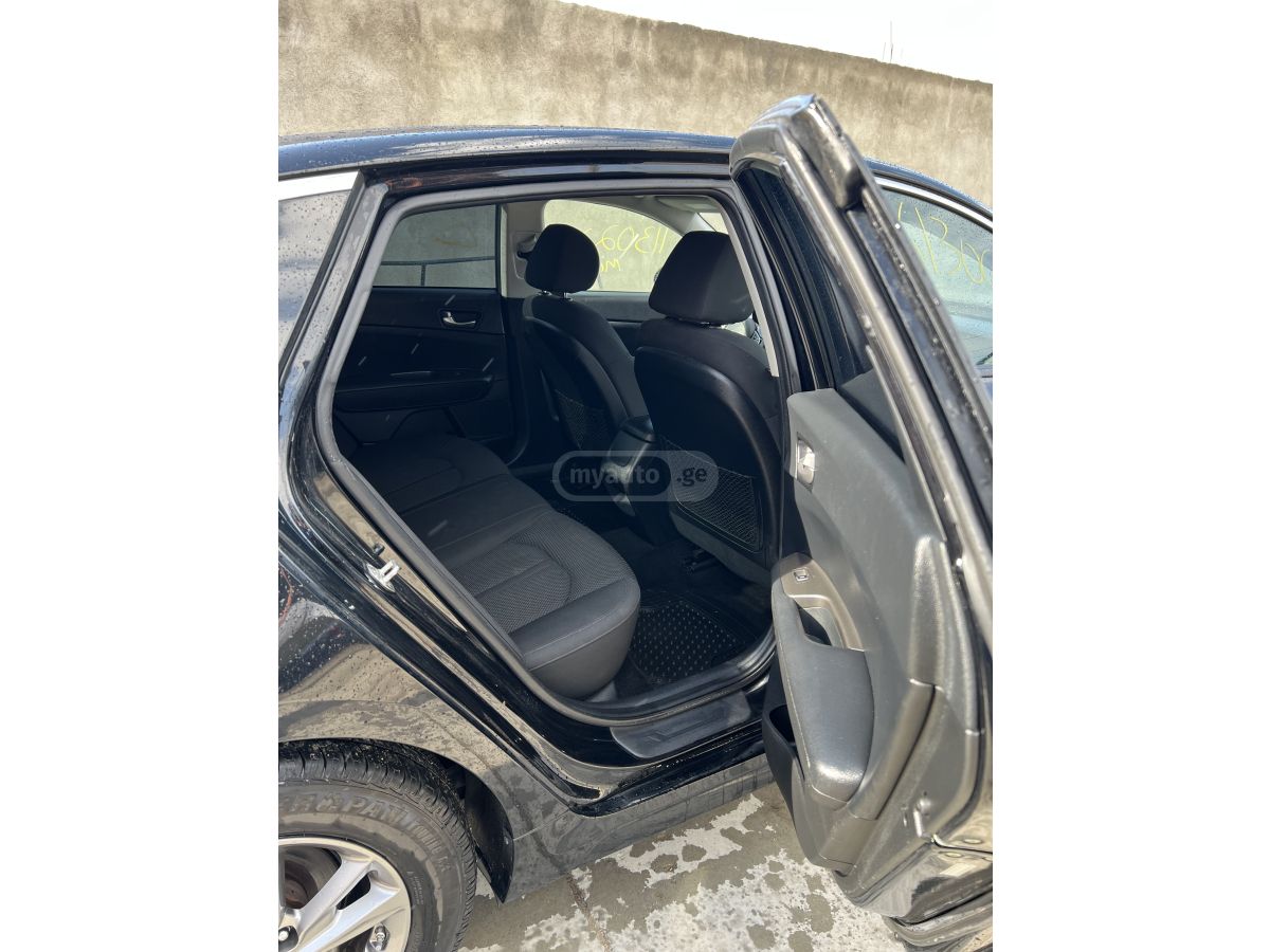 Kia Optima - фото 6