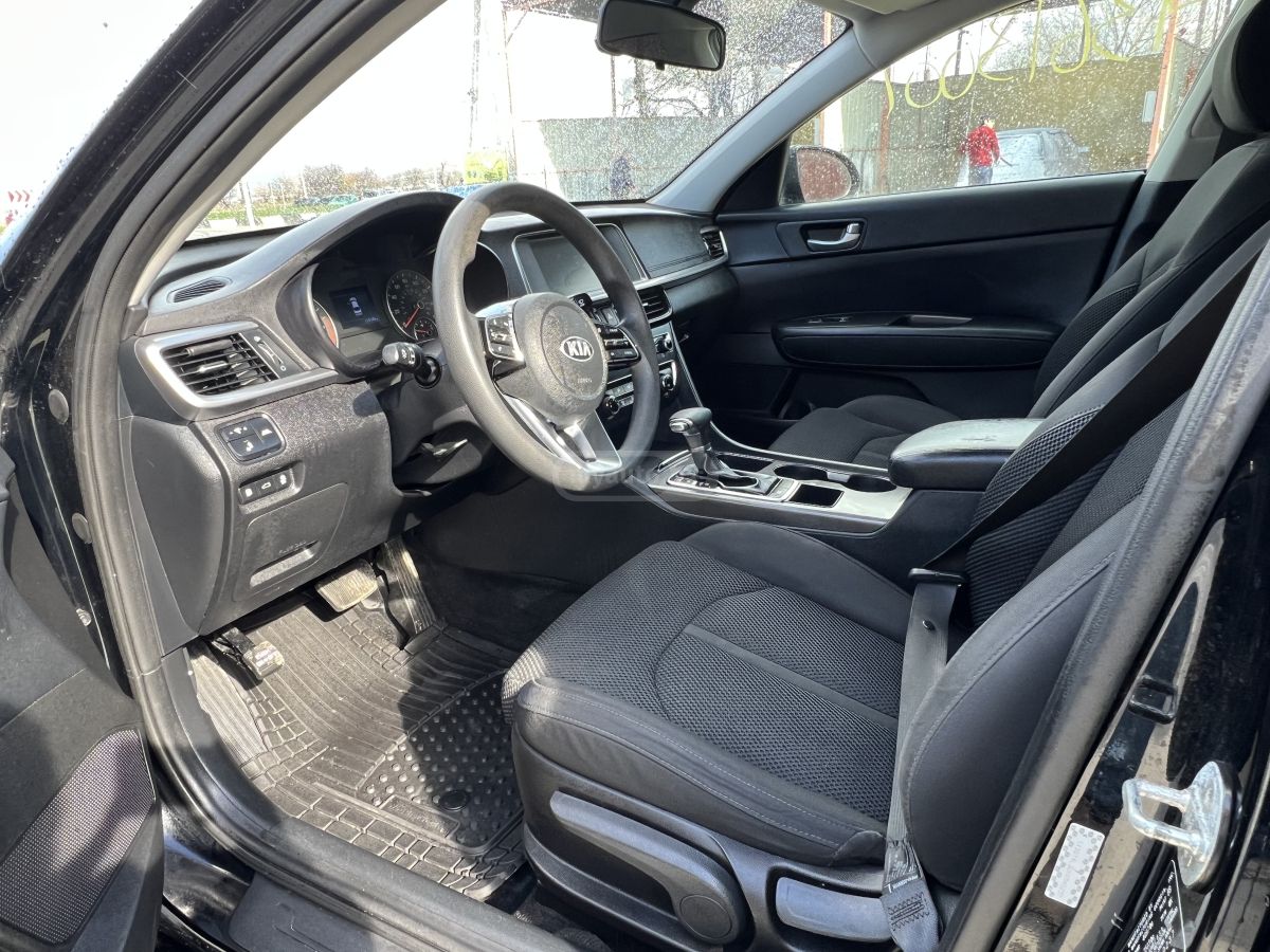 Kia Optima - фото 7