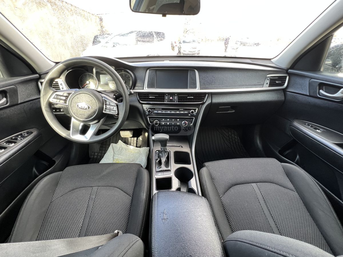 Kia Optima - фото 8