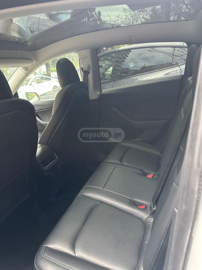 Tesla Model Y - фото 6