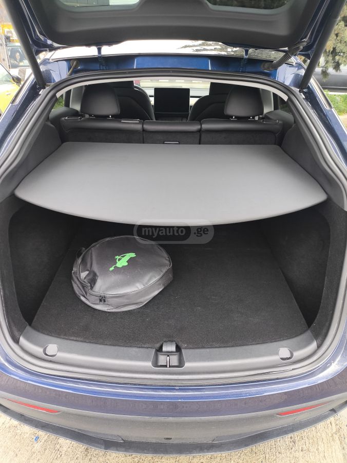 Tesla Model Y - фото 10
