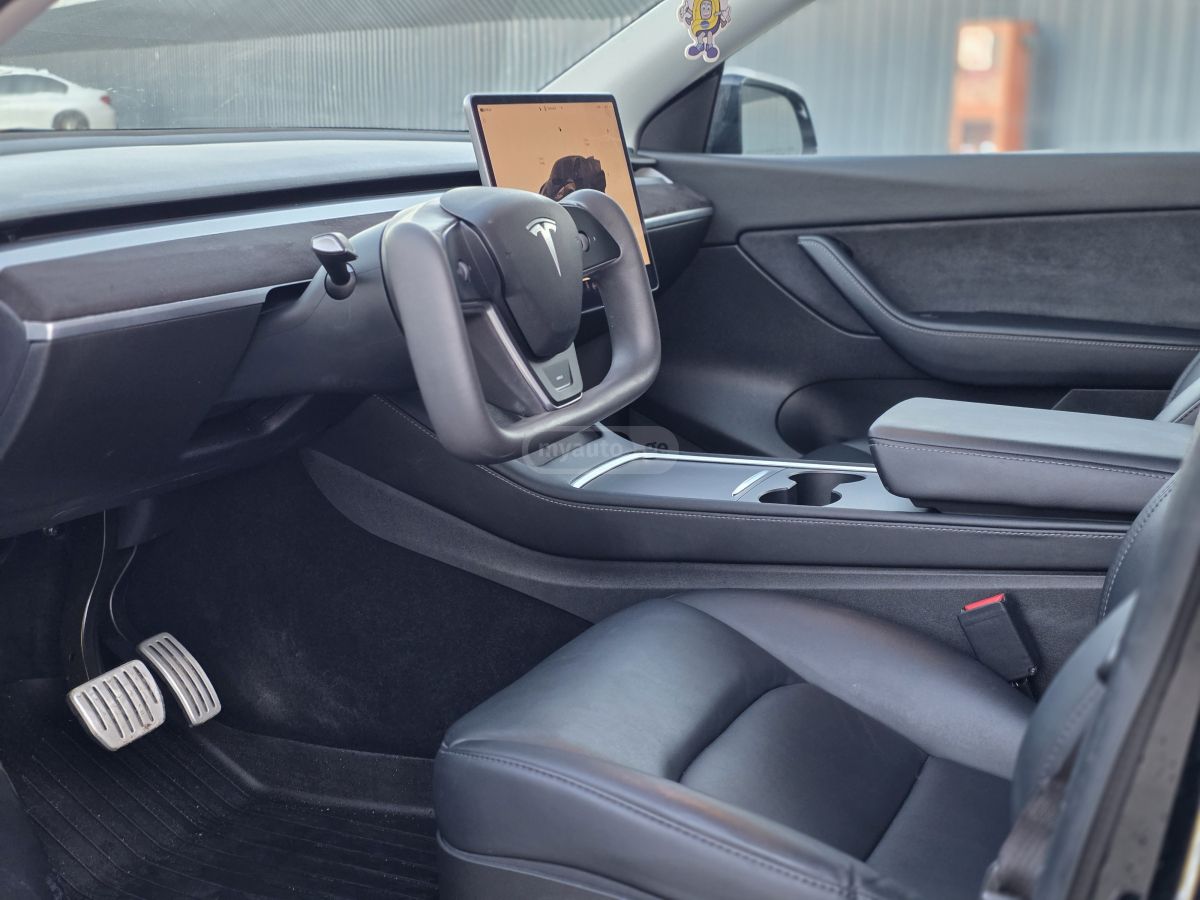 Tesla Model Y - фото 10