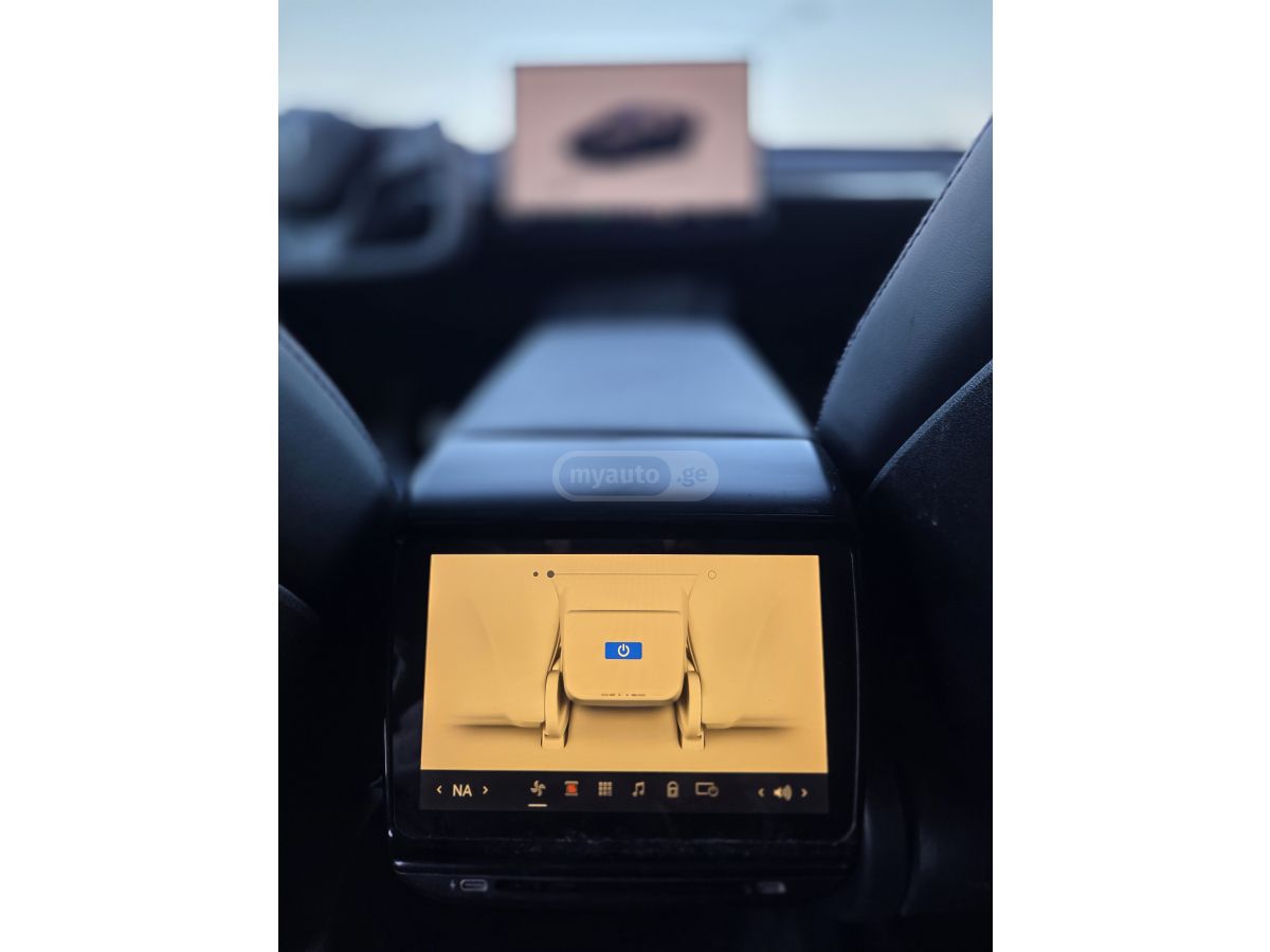 Tesla Model Y - фото 12