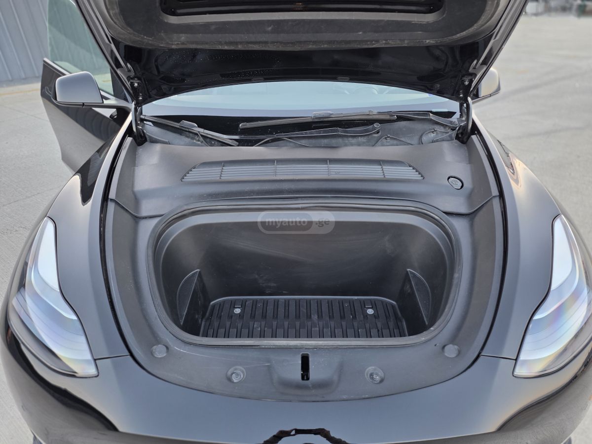Tesla Model Y - фото 14