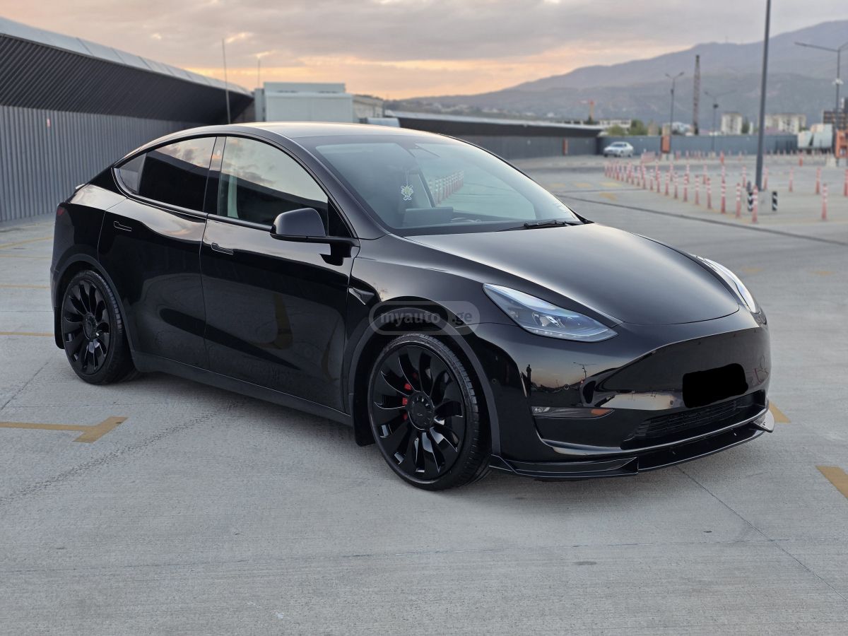Tesla Model Y - фото 2