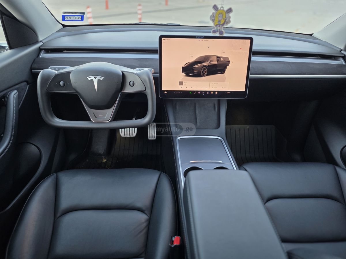 Tesla Model Y - фото 9