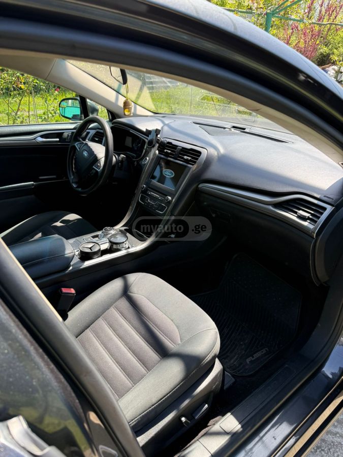 Ford Fusion - фото 5