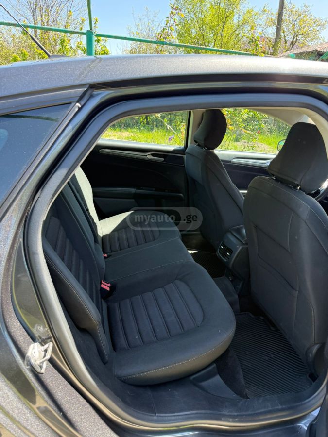 Ford Fusion - фото 9