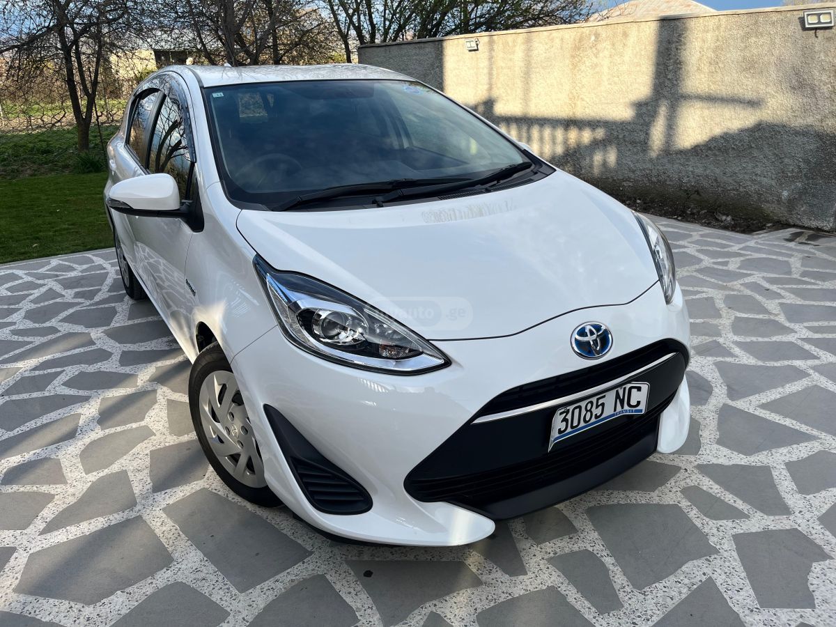 Toyota Aqua - фото 11