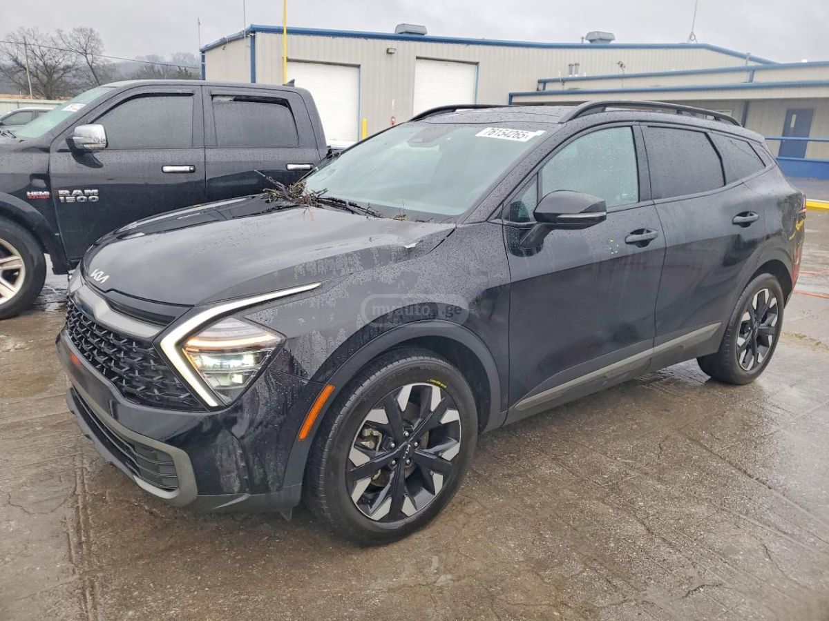 Kia Sportage - фото 1