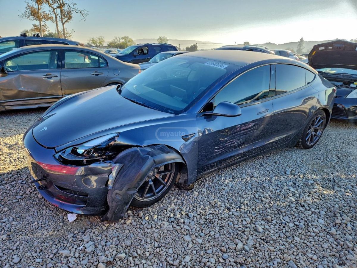 Tesla Model 3 - фото 12